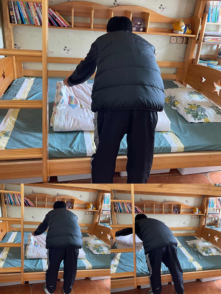 图片5：七年级十一班马梓浩在铺床叠被.jpg