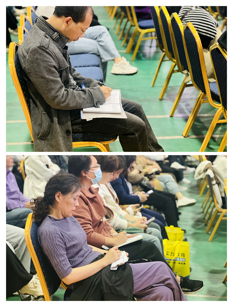 图片6.参会家长投入学习，认真笔记.jpg