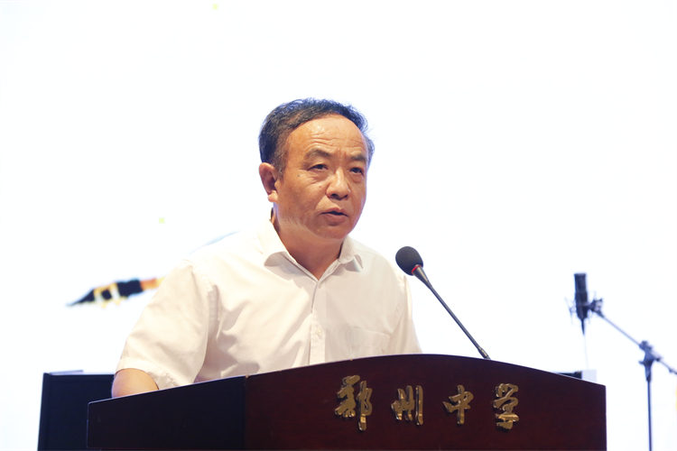 图片2：郑州中学党委副书记李文增致辞.JPG